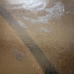 Détail des retouches vieillies